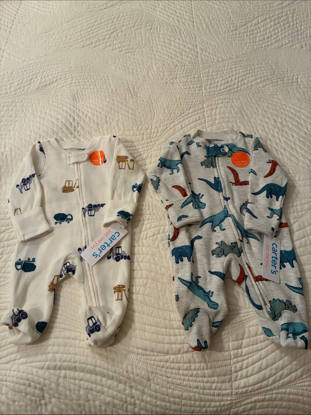 Carter's Cream Footed One-Pieces with Blue, Brown and Red Prints - 2-Pack